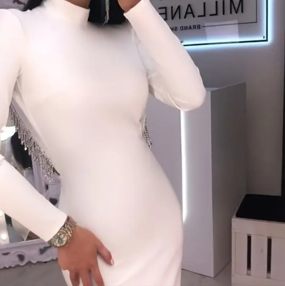 Beautiful white dress. Cut out back